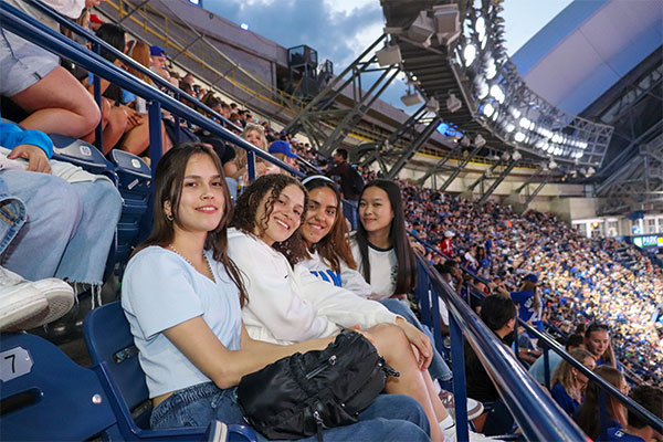 4 students at a blue jays game