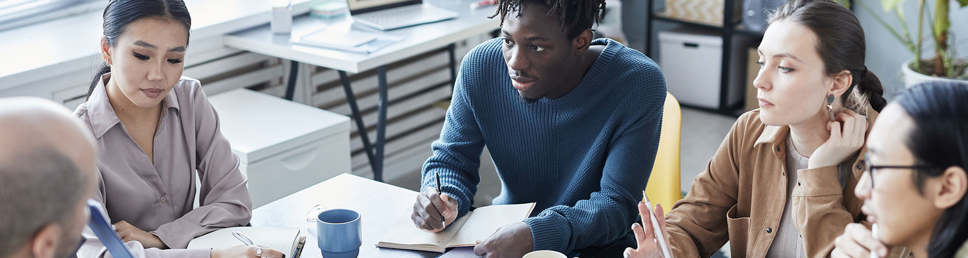 group of students sitting around a table