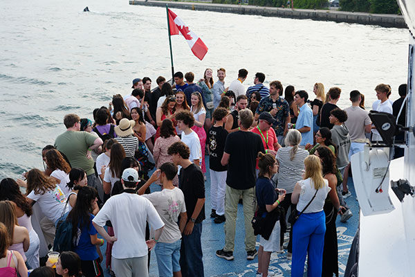 Group of students standing together smiling