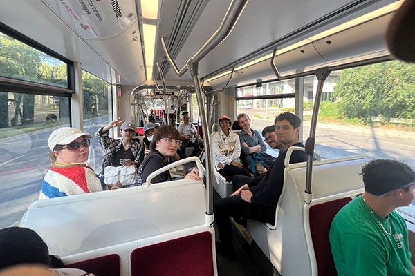 students sitting on a streetcar in Toronto
