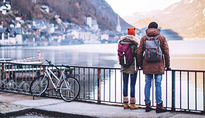 man and woman looking at view