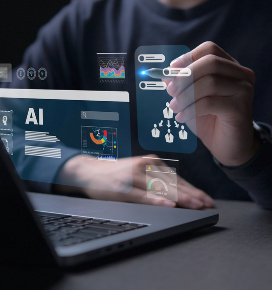 Person interacting with futuristic AI interface displaying data analytics, user flow diagrams, and performance charts on a laptop