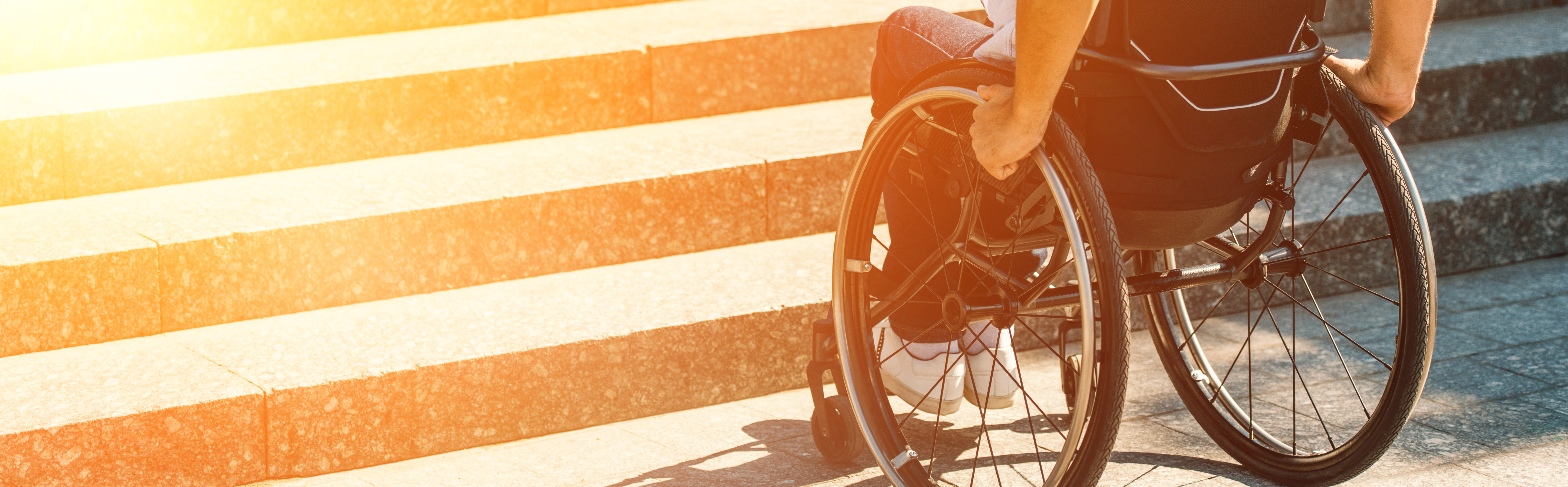 Cropped image of a man in a wheelchair