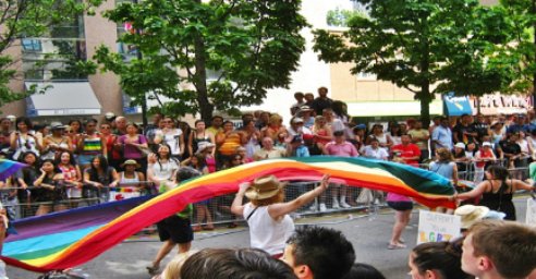 People march in the 2011 Toronto Pride parade
