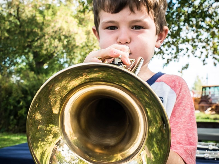 Child playing trumpet