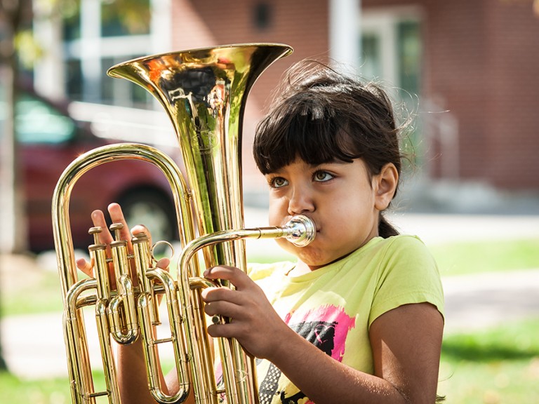 kid playing the tuba