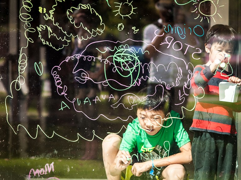 Kids drawing on glass