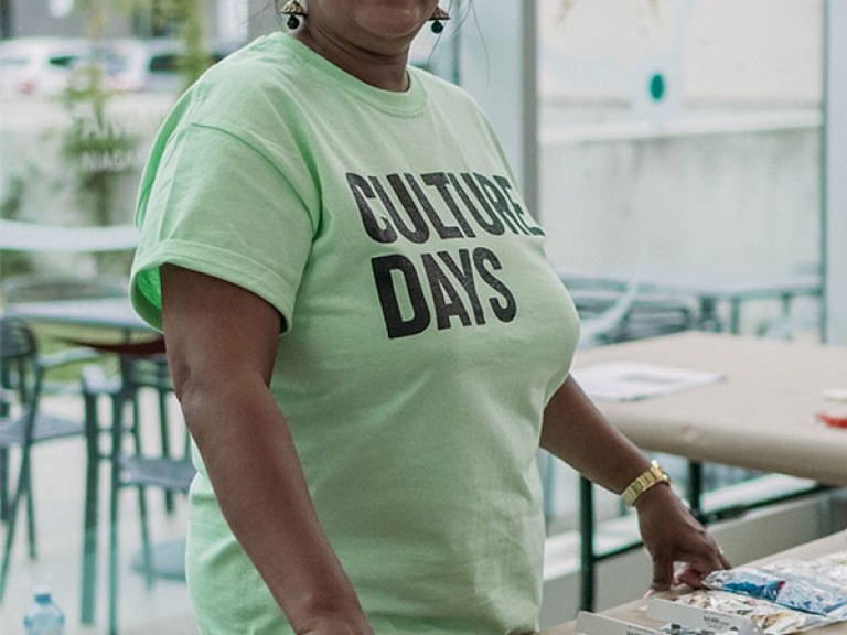 woman wearing a culture days shirt
