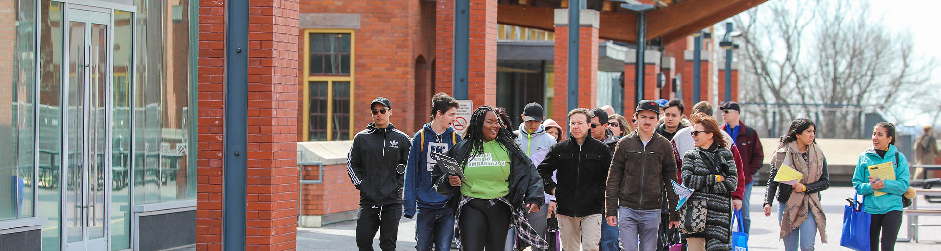 Group of people walking on campus