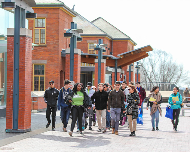 Students Walking in front of campus