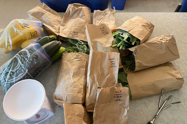 Brown bags filled with vegetables