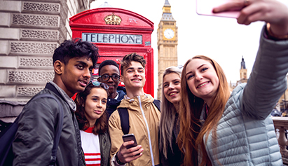 group of people taking a photo in london