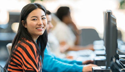girl sitting at computer