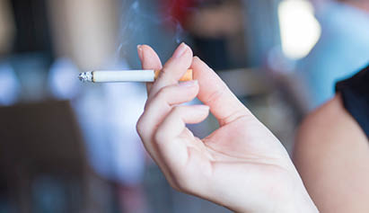 person holding cigerette