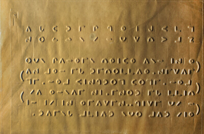 An open book with Moon Code braille