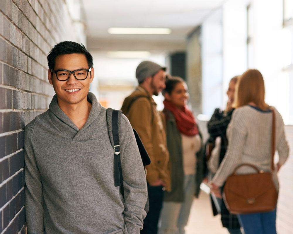 Person standing in school hall