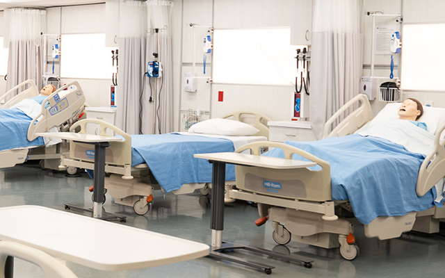 Hospital room with dolls