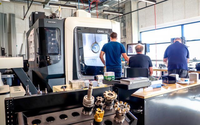 Students working with Machinery