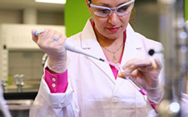 Person using lab equipment