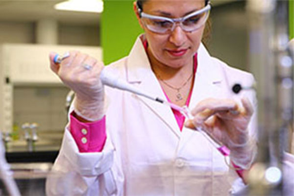 woman using lab equipment