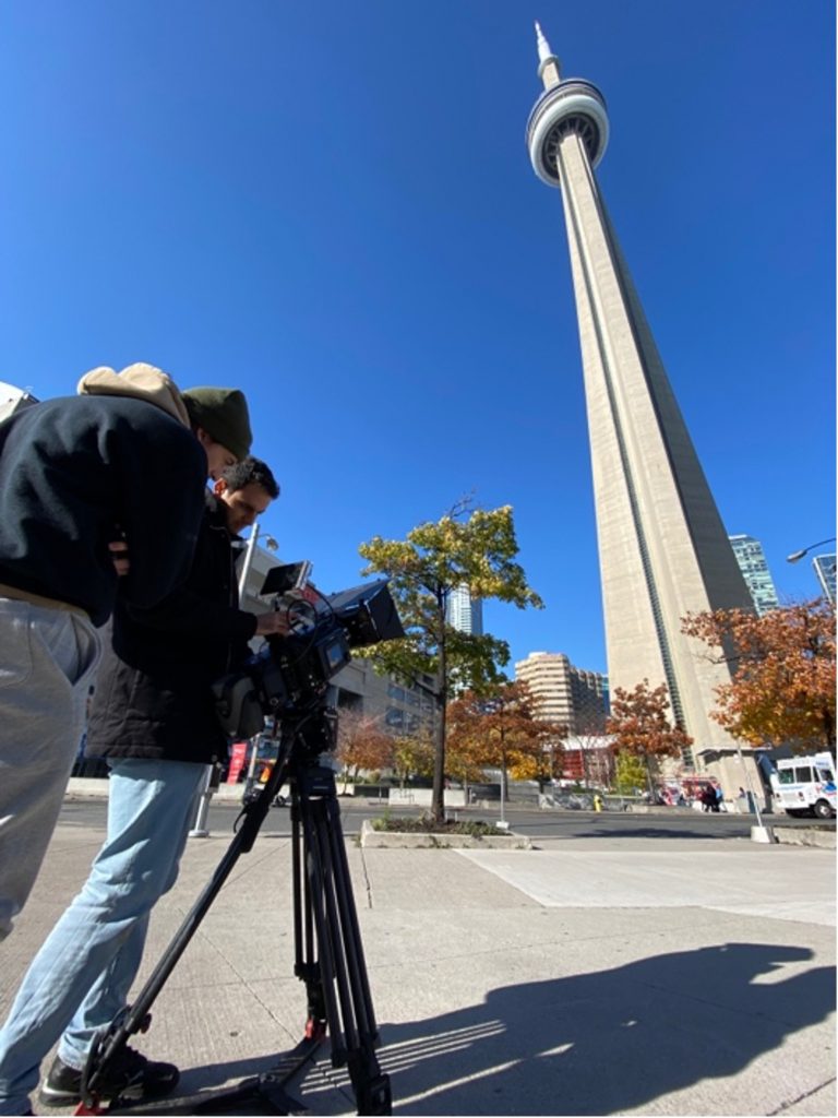 Daniel Ferreira and Domenic Paron filming the CN Tower.