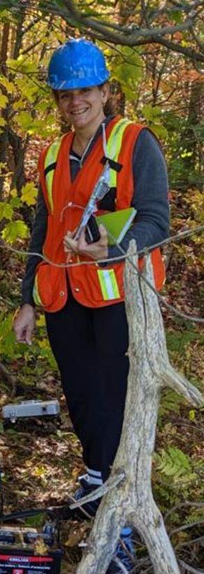 photo of Maria working in the field