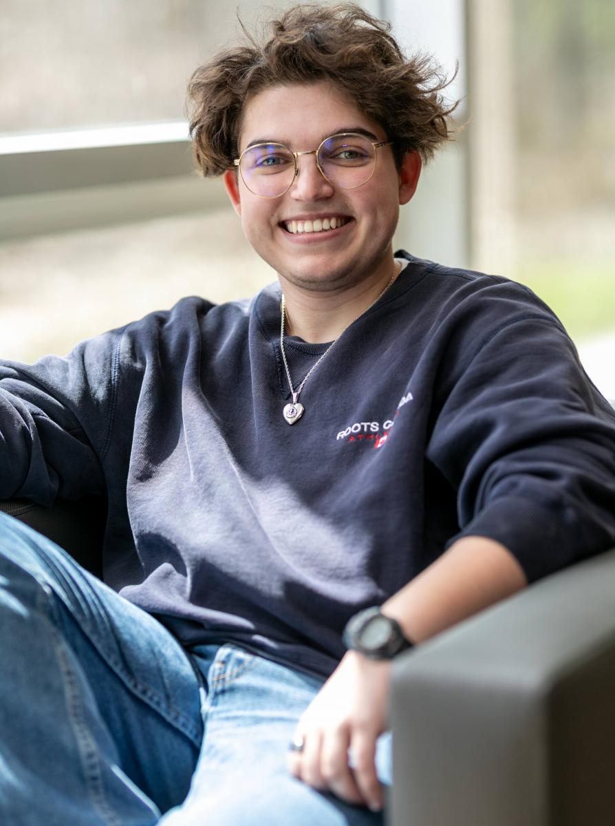 A student sitting in a chair