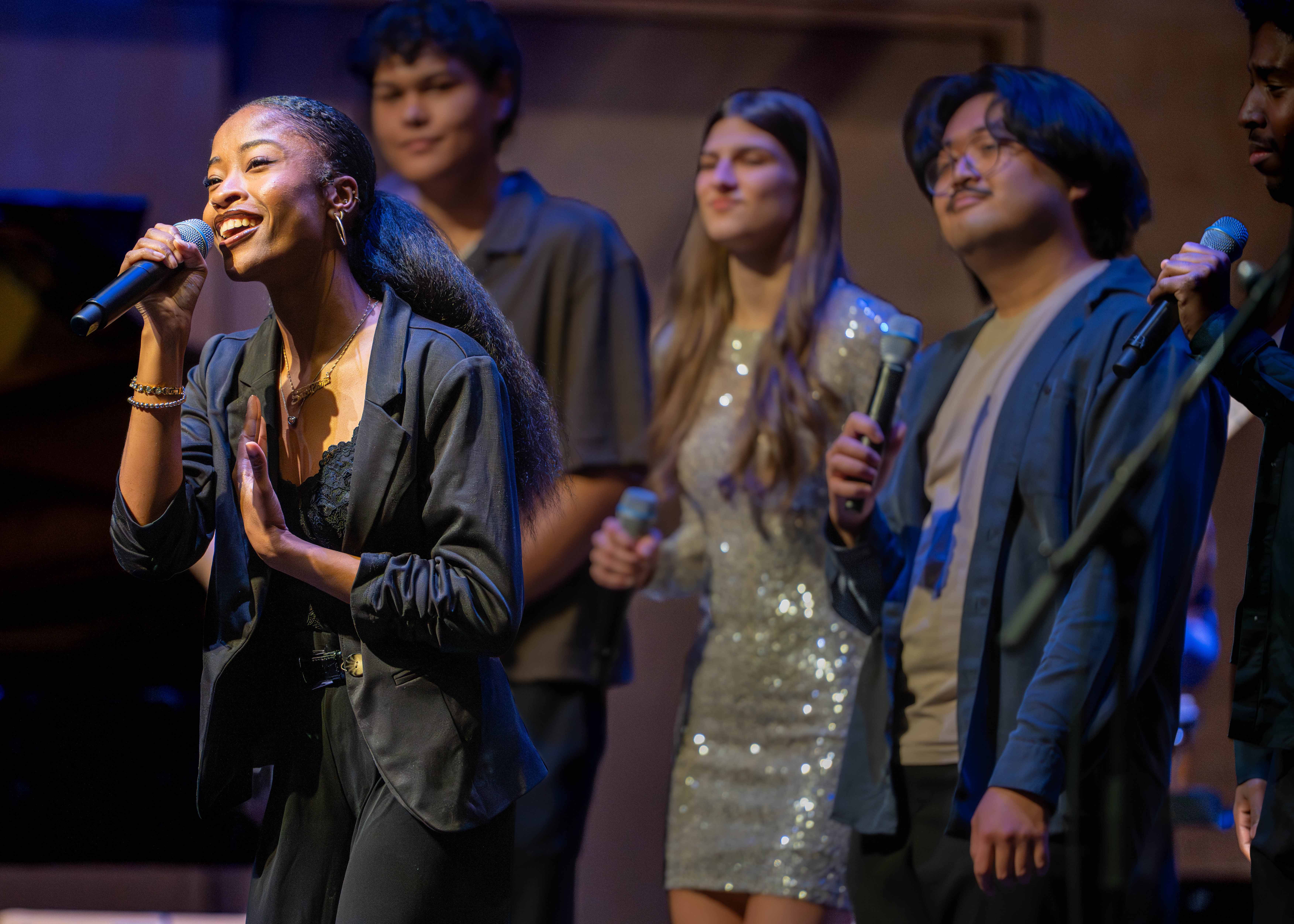 Humber students singing on stage.