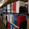A library stack at Humber College holds rows and rows of colourful books.
