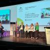 Representatives accept gold in the Excellence in Global Engagement award category at 2022 CICan Awards of Excellence