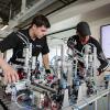Two students work on a project in the Skills Training Mechatronics Room