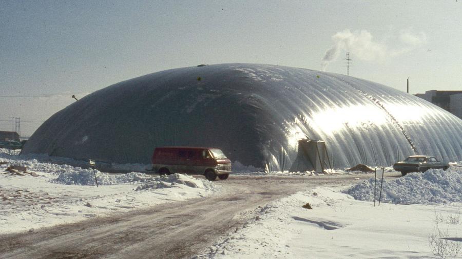 The exterior of a large, inflated canvas structure.