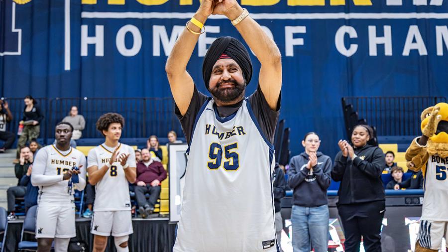 Raptors Superfan Nav Bhatia honoured with custom Humber Hawks jersey and lifetime pass