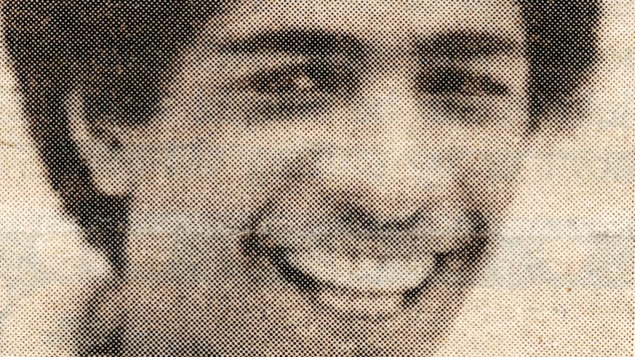 A black-and-white head-and-shoulders photo of a person.