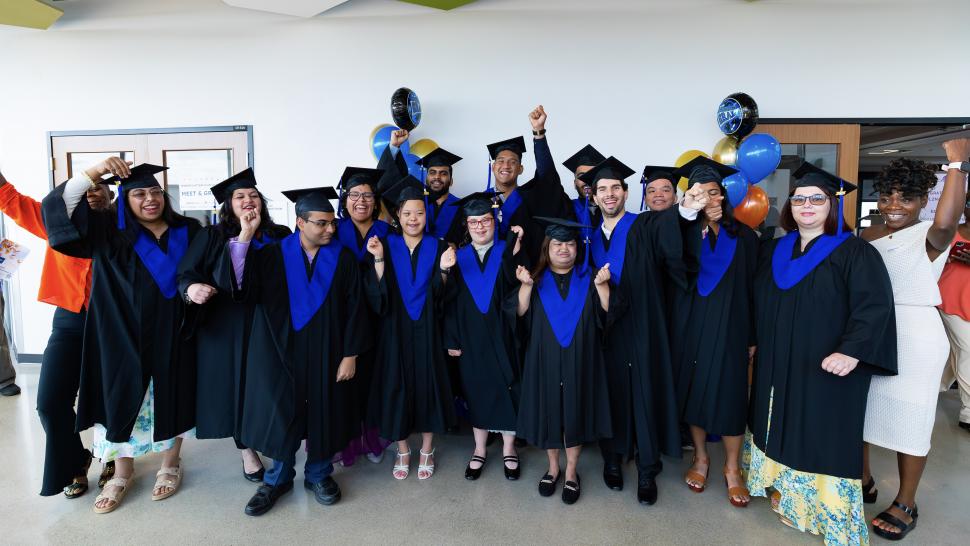 Karis Culinary program graduating class poses for a celebratory photo together