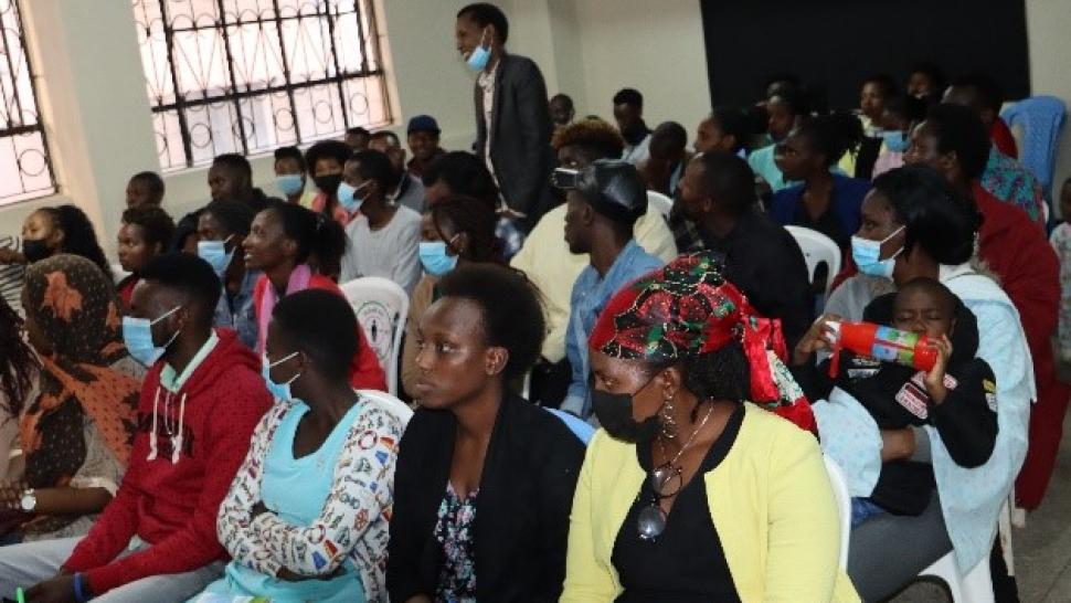 A full classroom of refugees in Kenya listen to a presentation