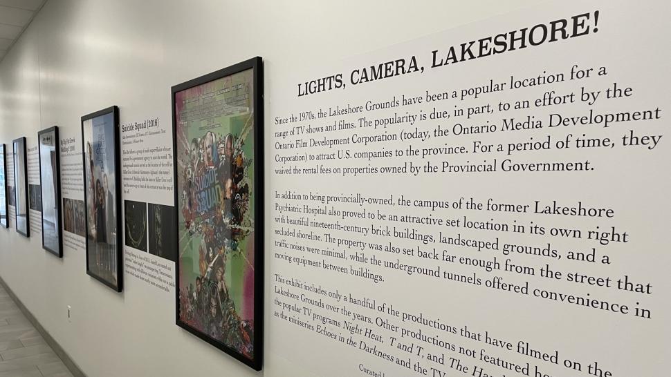 Humber College’s Lakeshore Campus has served as a popular filming location for movies, television shows, and commercials. A series of framed movie posters hanging on a wall next to the words Lights, Camera, Lakeshore! There is text below those words.