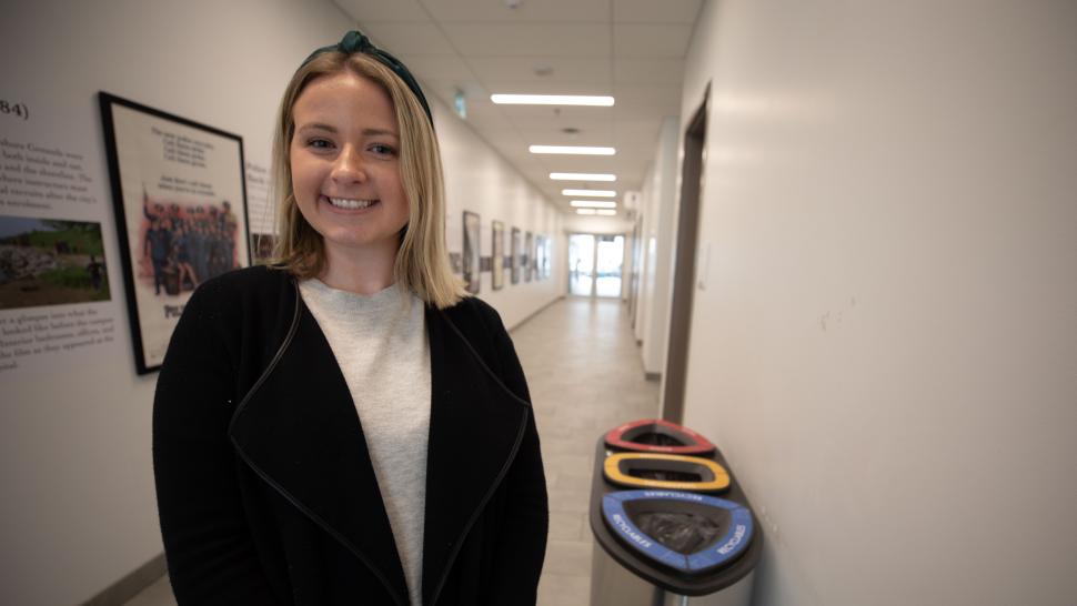 The bin next to Claire Chappell, PR student, will be retrofitted with new signage