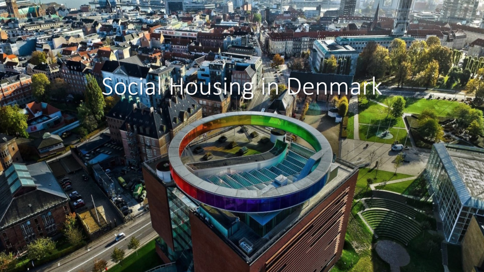 Sustainable Energy and Building Technology students took part in a collaborative online international learning opportunity with three overseas partner institutions. A photo of a city showing different housing developments. The words Social Housing in Denmark are written on the photo.