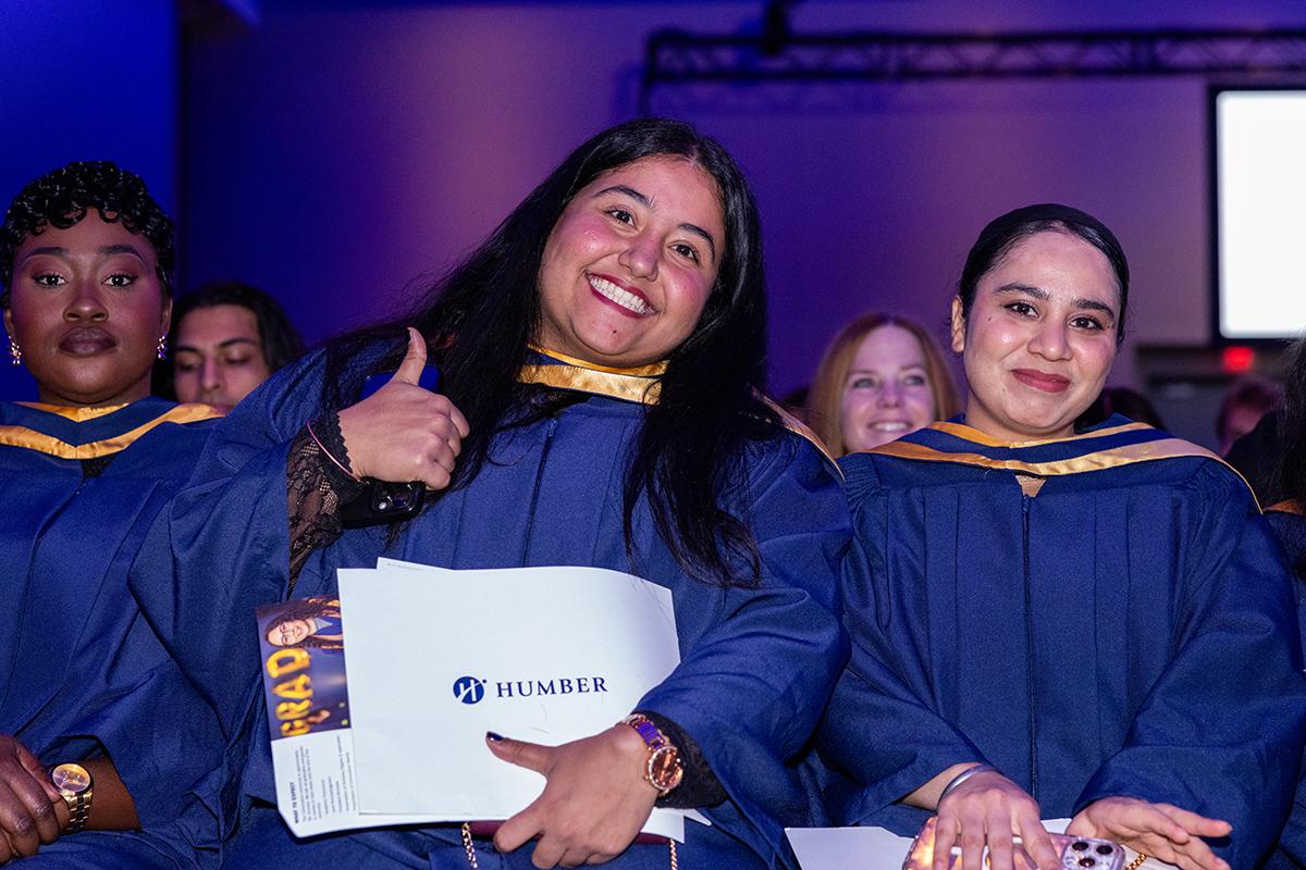More than 3,100 graduates crossed the stage to receive their credential as part of Humber Polytechnic’s Fall 2025 Convocation ceremonies. A smiling person gives a thumb’s up.