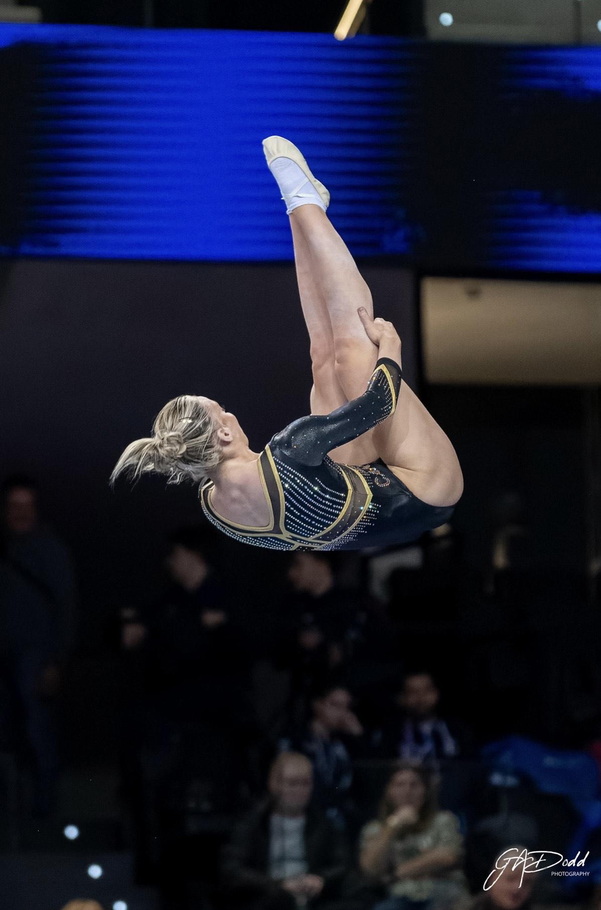 An athlete spins in the air.