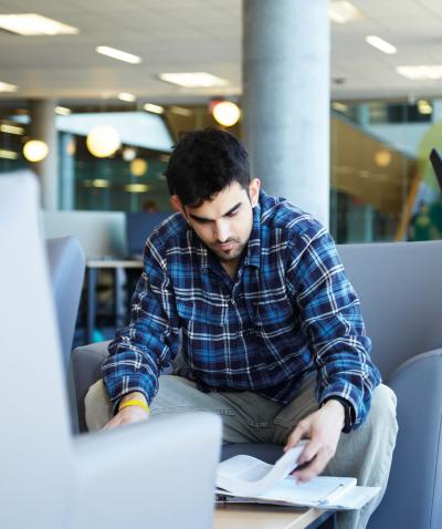 a male student studies alone at Humber College