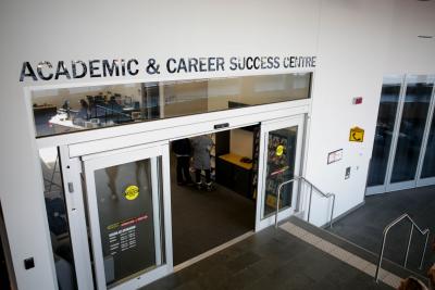 A room with a sign reading Academic & Career Success Centre posted above the doorway.