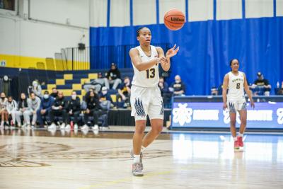 A player on the Humber Hawks' women's basketball team passes the ball during a game