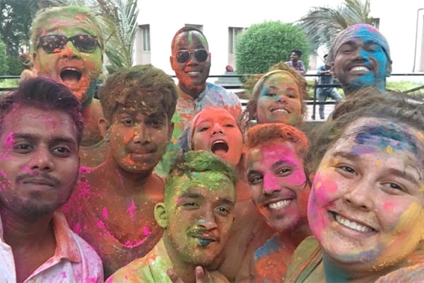 Students covered in paint