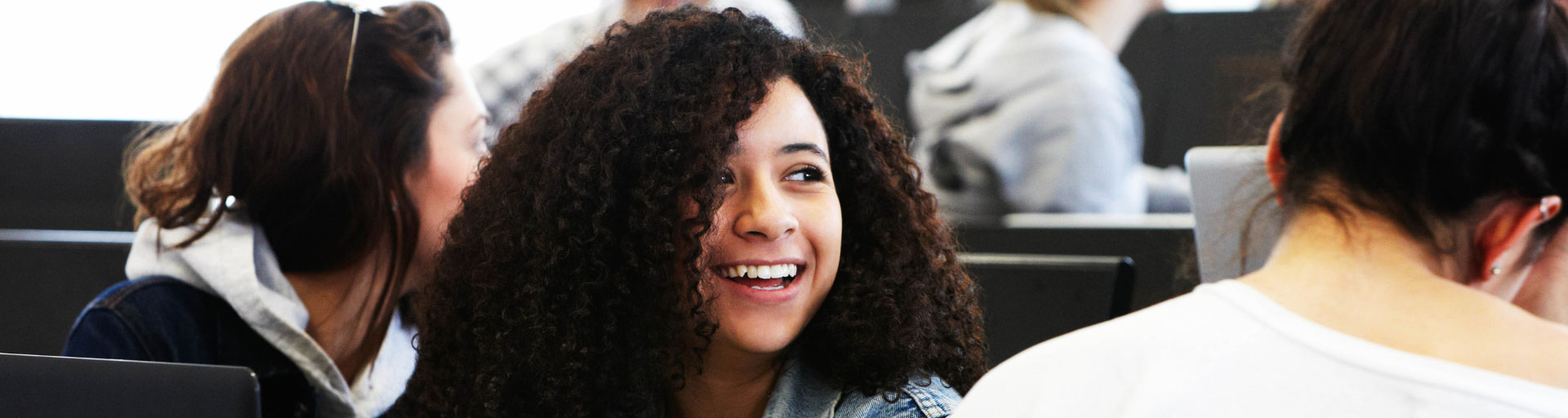 smiling student in class